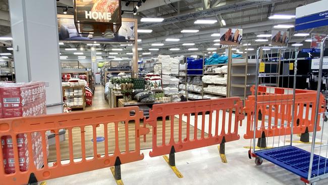 Non-essential items are blocked off in a Tesco supermarket in Cardiff, Wales, where people have been told to stay at home and pubs, restaurants, hotels and non-essential shops must shut until November 9. Picture: Getty Images