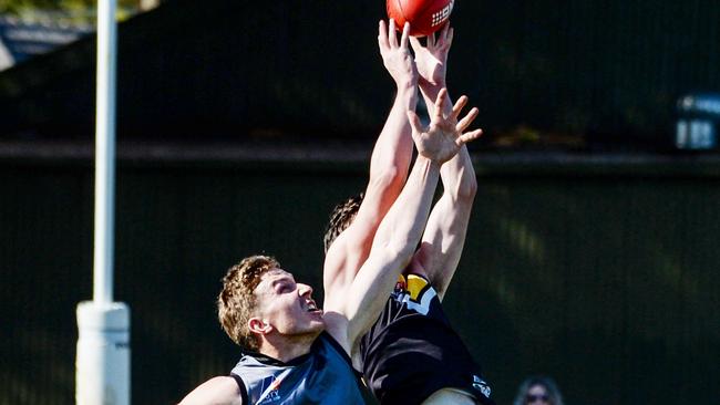 AUGUST 21, 2021: PortÃ&#149;s Sean Davidson and BrightonÃ&#149;s Jarman Sigal compete for a mark during Adelaide Footy League division one match between Brighton Bombers and Port District at Brighton Oval. Picture: Brenton Edwards