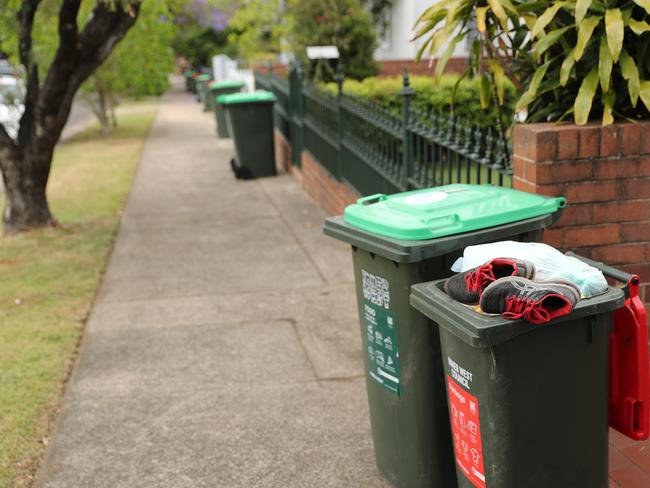 Full garbage bins, overloaded with rubbish on Hill and Balmain road in Leichhardt. The changes to collection have meant bins are always full. Picture Rohan Kelly.