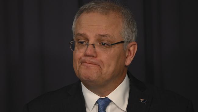 Prime Minister Scott Morrison referred to his two children as “being baby sat in the hall in front of computer screens”. Picture: AAP/Lukas Coch