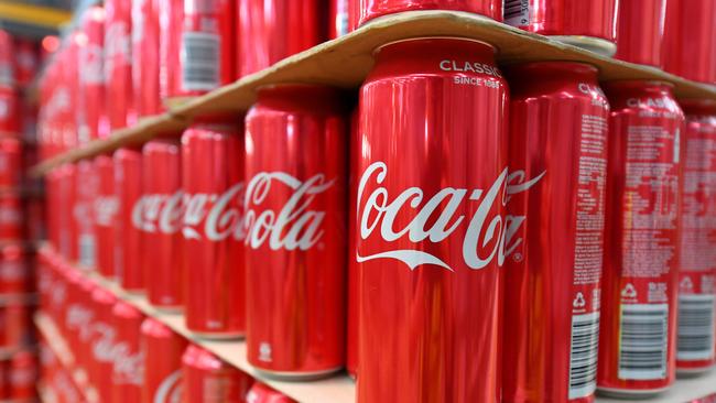 Cans of coke are seen at the Coca Cola factory in Melbourne. Picture: AAP / James Ross.