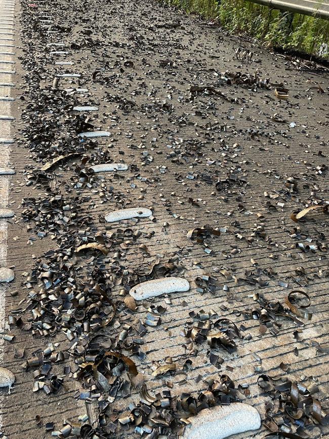 Millions of tiny and sharp shards of metal were spilt onto the M1 Motorway on Friday morning. Picture: Live Traffic NSW