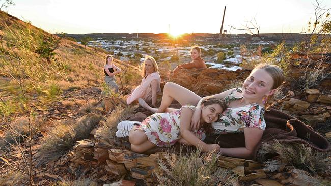 Mount Isa locals Gabby Ryder, 6, aunt Phoebe Ryder, 20, Zoe Ryder, 15, rear left, mum Kim Coghlan, rear centre, and Gabby’s mum, Gracie, 24. Picture: Lyndon Mechielsen