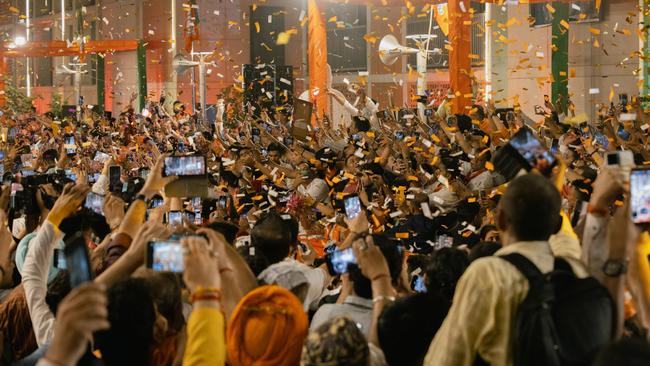 Modi supporters celebrate the election result in New Delhi on Tuesday. Picture: Elke Scholiers/Getty Images