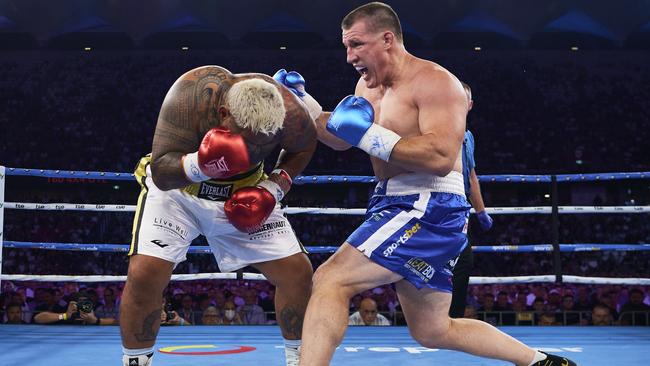 Paul Gallen taking on Mark Hunt last December. Picture: Getty Images