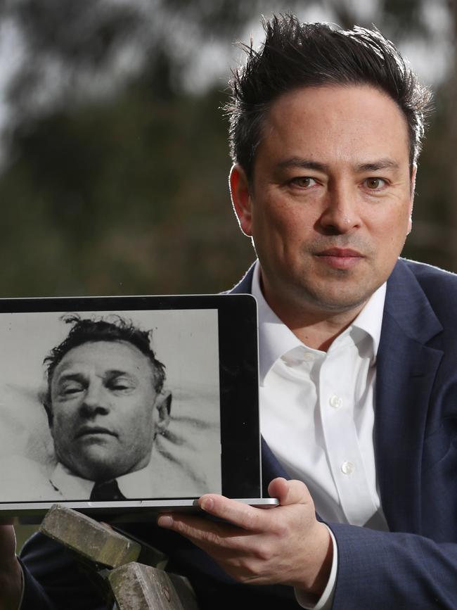 Antero Bonifacio, with a photograph of his cousin three times removed, Somerton Man Carl “Charles” Webb. Picture: David Crosling