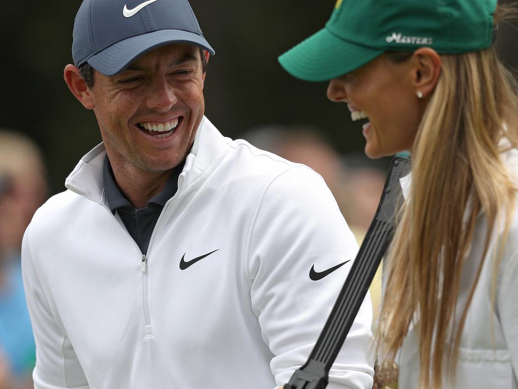 Rory McIlroy of Northern Ireland laughs with his wife Erica during the Par 3 Contest prior to the start of the 2018 Masters Tournament at Augusta National Golf Club on April 4, 2018 in Augusta, Georgia. (Photo by Patrick Smith/Getty Images)