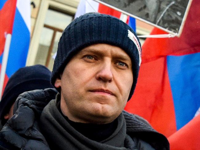 (FILES) Russian opposition leader Alexey Navalny attends an opposition march in memory of murdered Kremlin critic Boris Nemtsov in central Moscow on February 25, 2018. Russian opposition leader Alexei Navalny died on February 16, 2024 at the Arctic prison colony where he was serving a 19-year-term, Russia's federal penitentiary service said in a statement. (Photo by Vasily MAXIMOV / AFP)