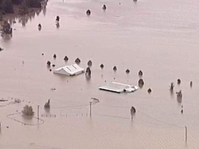 Aerial image of houses vanishing in flood waters in Camden. Picture: Channel 9