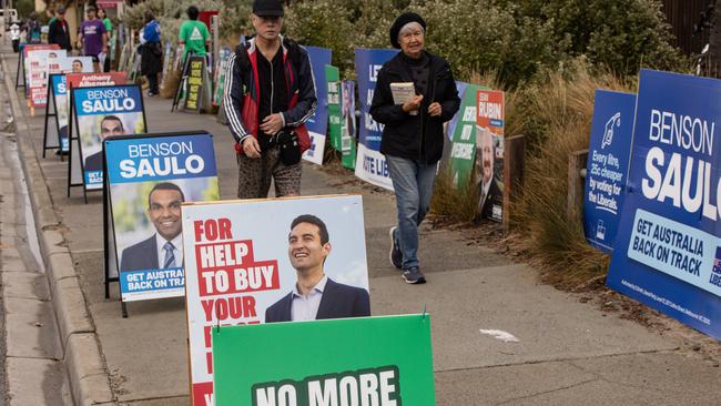 Election corflutes are seen outside a voting station in Macnamara. Picture: Diego Fedele
