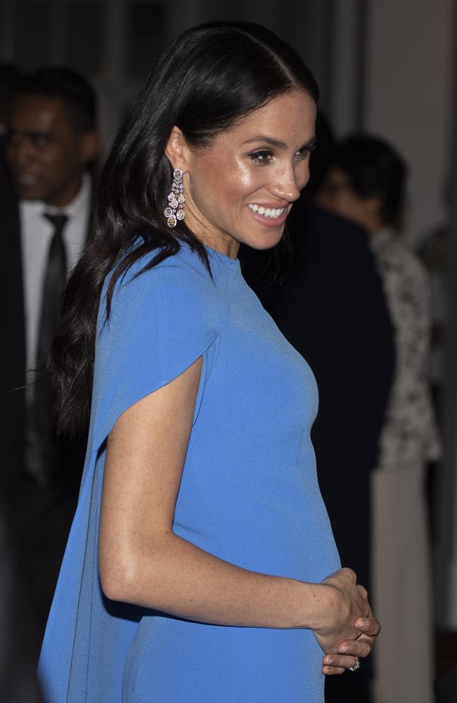 Markle attended a Fiji state dinner wearing a loose fitting Safiyaa dress and cap. Picture: Getty Images.