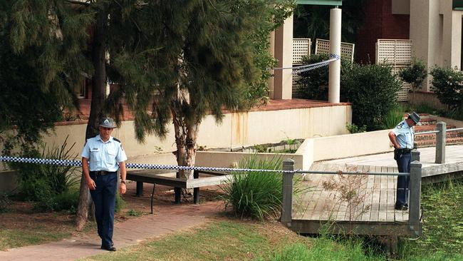 Police at the scene of Philip Carlyle’s killing at Robina.