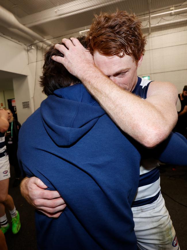 Rohan embraces Chris Scott post-match. Picture: Michael Willson/AFL Photos via Getty Images