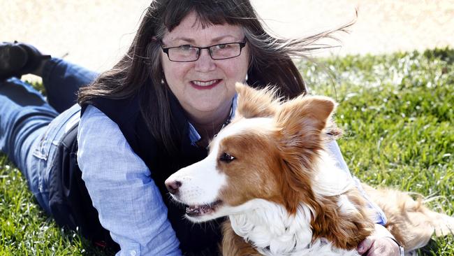 Dog behaviourist Merry Conway, with beige border collie Sweep, has plenty of tips on how to make your dog less anxious. Picture: KIM EISZELE