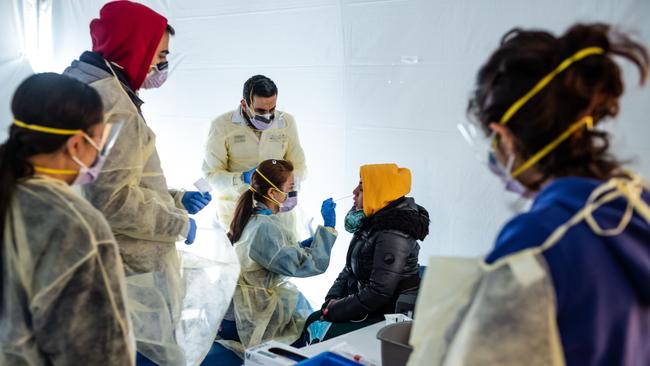 Doctors test hospital staff with flu-like symptoms for coronavirus (COVID-19) in set-up tents in the Bronx. Picture: AFP