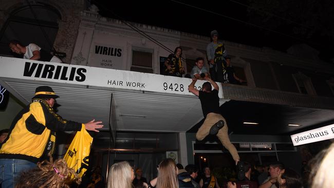 Revellers could be seen climbing onto a roof.