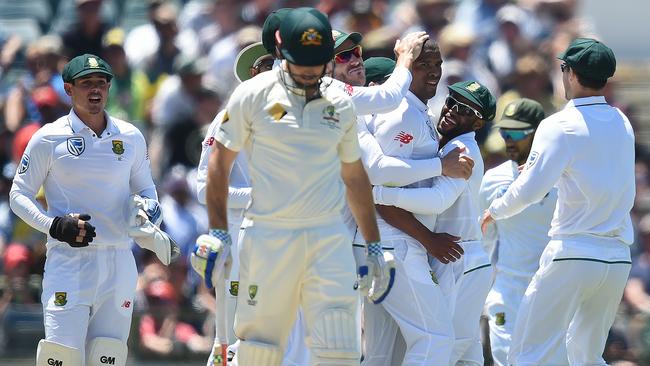 South Africa celebrates after dismissing Shaun Marsh for 63.