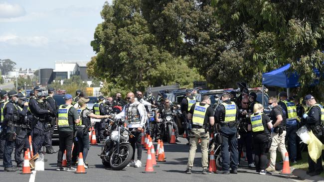 Police intercept members of the Nomads motorcycle gang as they leave their Laverton North clubhouse. Picture: Andrew Henshaw