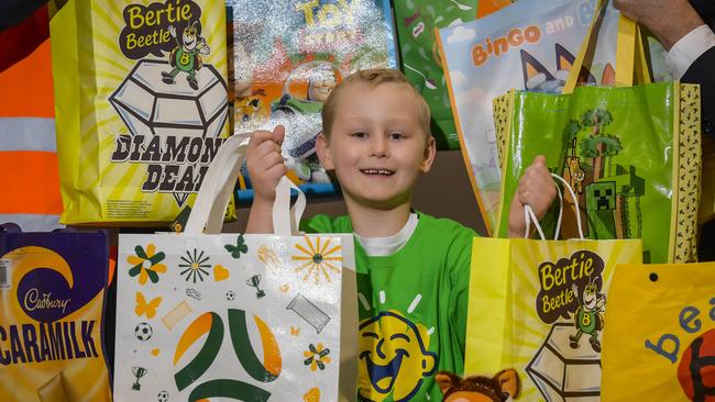 Eight-year-old Ezra will be spoilt for choice with this year’s showbags ranging from Bertie Beetle to Matildas. Picture: Roy VanDerVegt