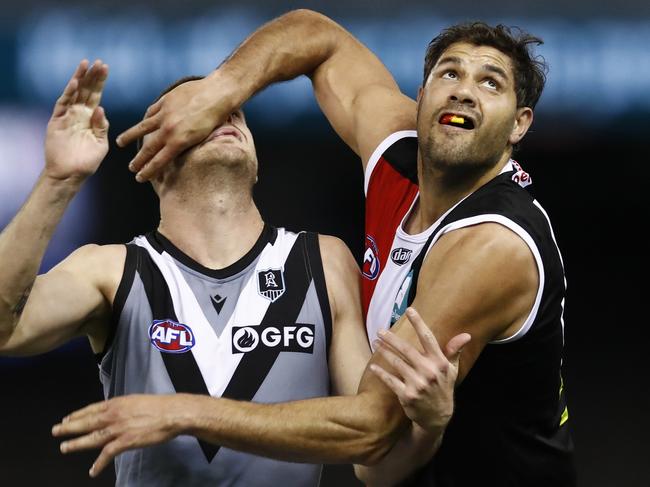 MELBOURNE, AUSTRALIA - JULY 17: Peter Ladhams of the Power and Paddy Ryder of the Saints compete during the round 18 AFL match between St Kilda Saints and Port Adelaide Power at Marvel Stadium on July 17, 2021 in Melbourne, Australia. (Photo by Darrian Traynor/Getty Images)