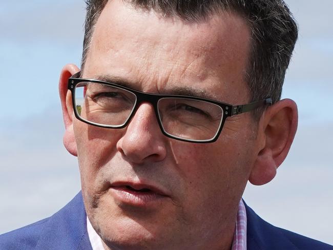 Victorian Premier Daniel Andrews (centre) speaks to the media while State MPs Mary-Anne Thomas (left) and Martin Foley watch on during a press conference in Melbourne, Wednesday, October 24, 2018. The premier has announced that Victoria will hold a royal commission into mental health if Labor is re-elected next month. (AAP Image/Alex Murray) NO ARCHIVING