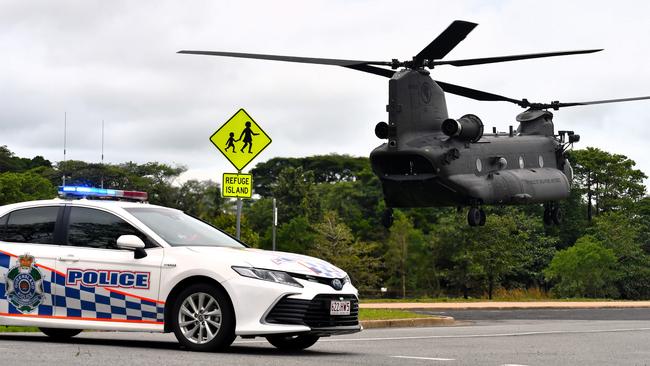 A Singapore air force CH-47F Chinook Helicopter landing outside Ingham State High School on Sunday. The floods in Hinchinbrook Shire, North Queensland. Picture: Cameron Bates