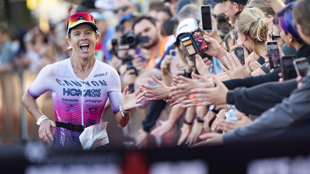 Cairns Iron Man - Womens Pro Winner Sarah Crowley ecstatic as he crosses the finish line e. Picture: Brian Cassey