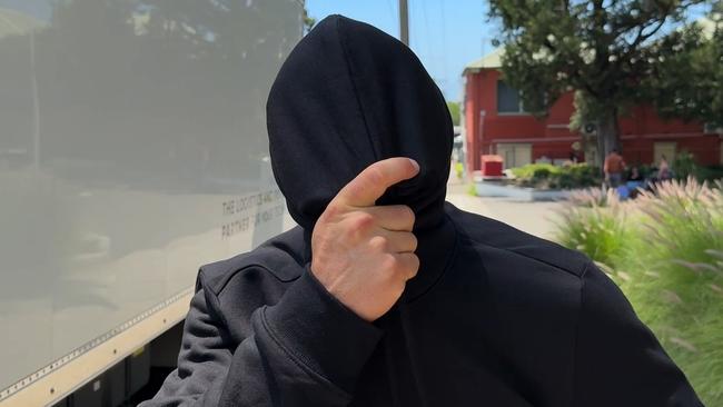 Troy Upward, who was wearing a colourful shirt, waited more than an hour to leave court in a black hoodie. Picture: Dylan Arvela