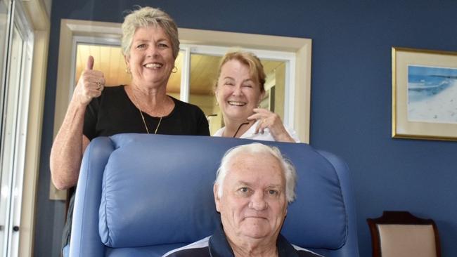 West Ballina residents John Chaseling (front), Anne Lodington (left ) and Marilyn Chaseling (right) celebrate the court's decision to oppose the proposed 300-home development by GemLife.