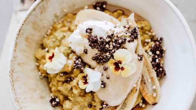 Charred banana and steel-cut oat porridge with salted caramel tahini and coconut yoghurt at Stable Coffee Kitchen.