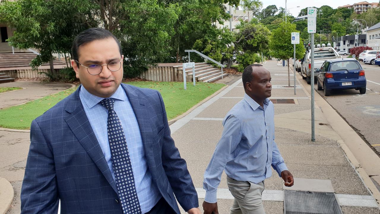 John Mugambi Mwamba (right) as supported by Defence lawyer Mathai Joshi in his appearance at the Townsville Magistrates Court on Tuesday. Photo: Leighton Smith