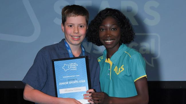 Swimmer Brendan Holden with former winner and athletics star Bendere Oboya.