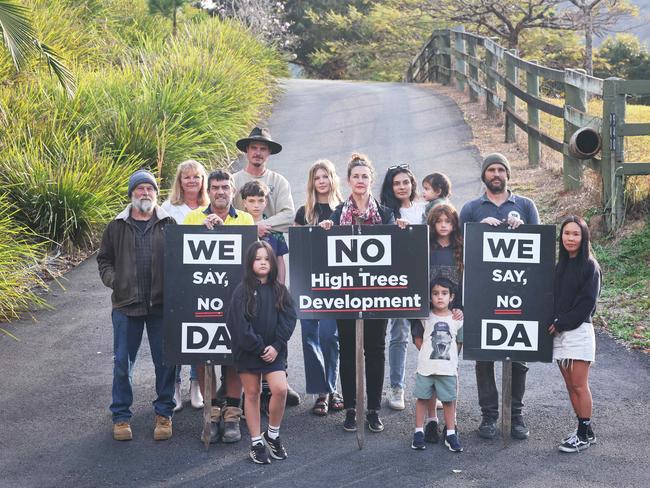 Spokesperson Kaylee Campradt and fellow Currumbin Valley neighbours and residents stand in the driveway for a new boutique school they are opposed to in the Hinterland suburb. High Trees Primary will be built in the Currumbin Valley and will be one of the first new schools built on the Coast in recent years. The group are opposing the school, arguing it is inappropriate for the area, will generate too much traffic and that there is a lack of necessary infrastructure. Picture Glenn Hampson