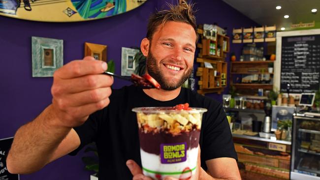 Bomdia Bowls owner Dale Brewster with an acai bowl at his Moseley St shop. Picture: Tom Huntley.