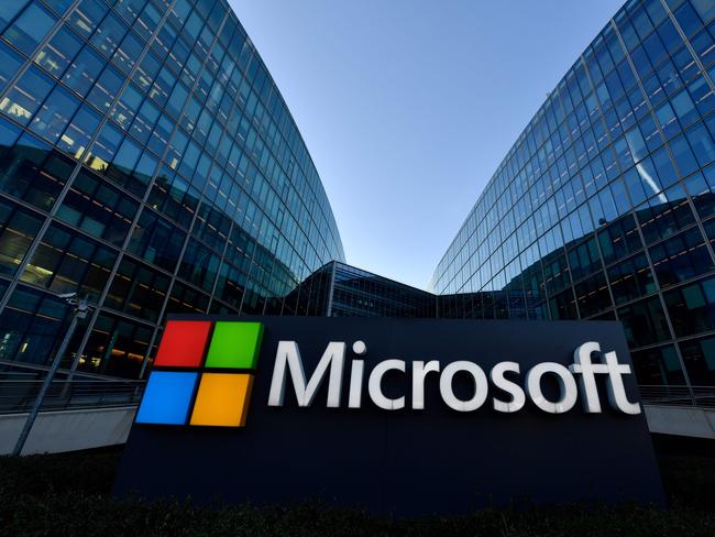 (FILES) In this file photo taken on March 6, 2018 The logo of French headquarters of American multinational technology company Microsoft, is pictured in Issy-Les-Moulineaux, a Paris' suburb. - Microsoft and Zoom on July 7 joined other major internet firms that have stopped considering requests by Hong Kong's government for information on users in the wake of China's imposition of a sweeping new security law. (Photo by GERARD JULIEN / AFP)