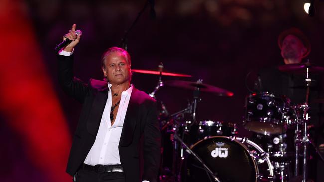 Jon Stevens performs at Shane Warne’s memorial service at the MCG. Picture: Michael Klein