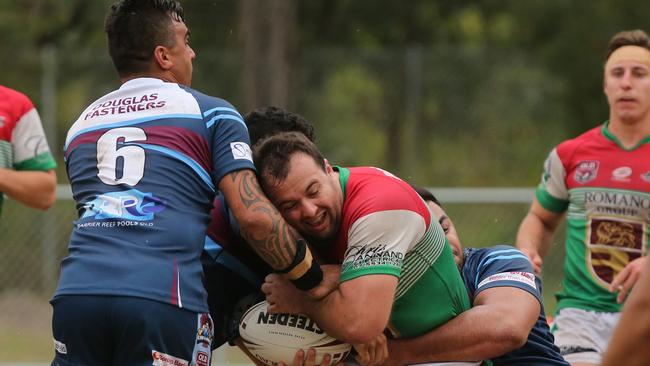 Ormeau playmaker Grayson Te Kiri (left) makes a tackle. Picture: Mike Batterham