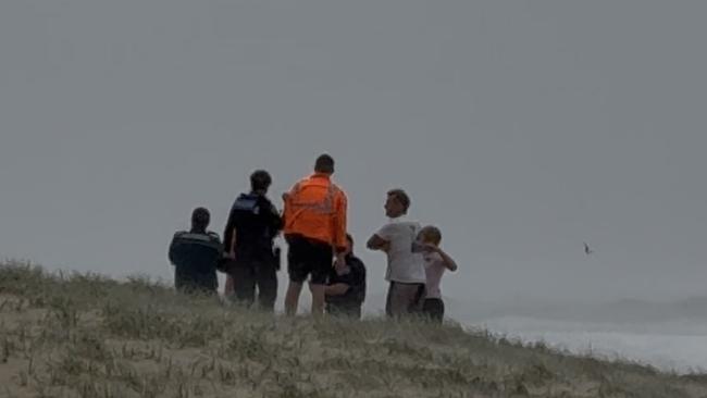 First responders searching for lost swimmers at Surfers Paradise.