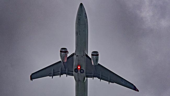 Virgin flight VA1422 takes off from Cairns under rain and threatening skies bound for Sydney, Sunday 8th May. Picture: Brian Cassey