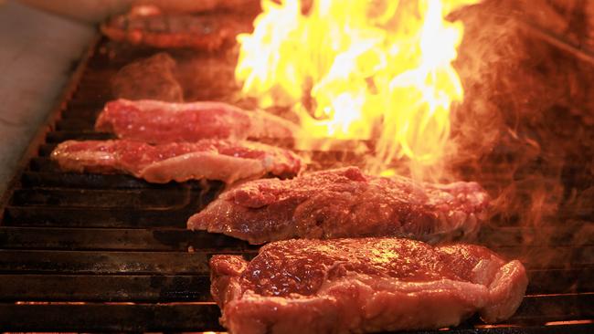 Daily Telegraph. 28, June, 2023.Chef Jamie Gannon, with the supermarket steaks, at Woolly Bay Hotel, Woolloomooloo, today.(yarn about the best supermarket steaks available) Picture: Justin Lloyd.