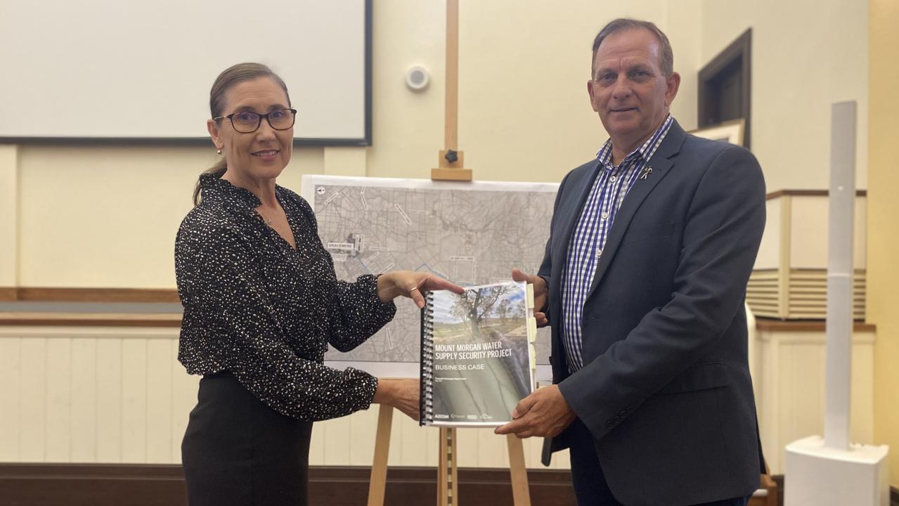 Rockhampton Regional Council spokeswoman for Water and Environmental Sustainability Donna Kirkland and Mayor Tony Williams with the detailed business case for the Mount Morgan pipeline.