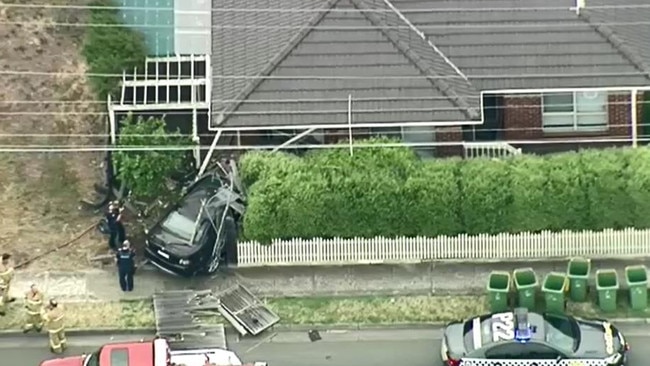 A driver has fled after crashing into the side of a house at Reservoir in Melbourne’s north this morning. Picture: 9 News Melbourne.