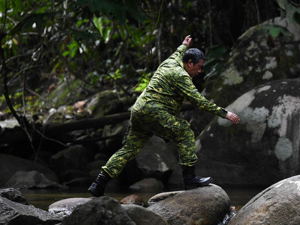 A member of a Malaysian rescue team takes part in a search and rescue operation as they attempt to locate Nora Quoirin. Picture: AFP