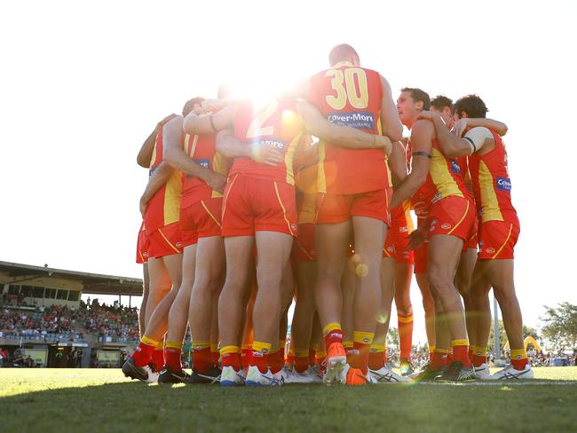 The Suns huddle during the 2019 AFL round 13 match between the Gold Coast Suns and the St Kilda Saints at Riverway Stadium on June 15, 2019 in Townsville, Australia. (Photo by Michael Willson/AFL Photos via Getty Images)