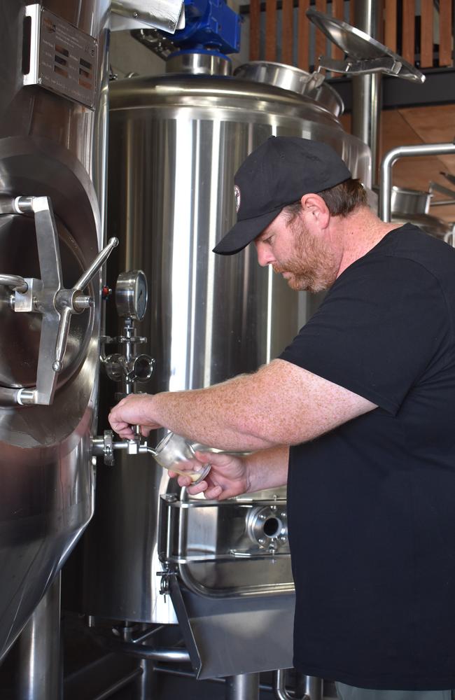 Co-owner Jamie Woods at Red Dog Brewery at the corner of Victoria St and Chain St in Mackay. The craft brewhouse has six brews and will do seasonal or limited brew beers. All are brewed onsite. The brewery is set to open on Friday, April 1, 2022. Picture: Tara Miko