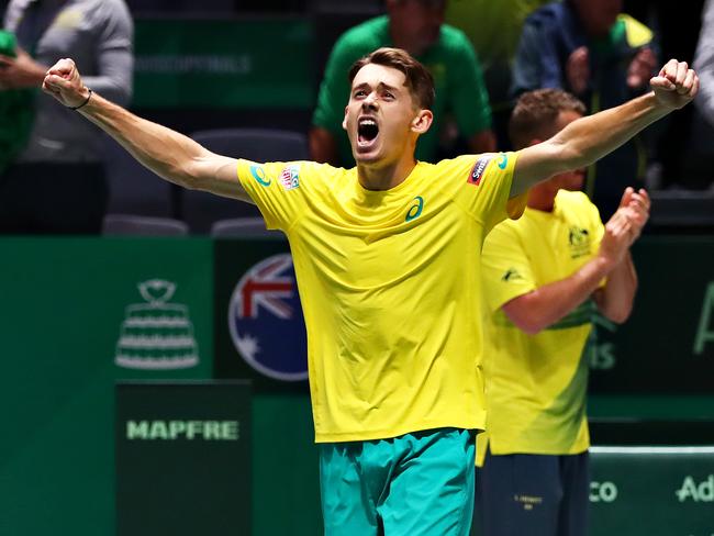 MADRID, SPAIN - NOVEMBER 21: Alex De Minaur of Australia celebrates winning his match in his quarter final singles match against Denis Shapovalov of Canada during Day Four of the 2019 Davis Cup at La Caja Magica on November 21, 2019 in Madrid, Spain. (Photo by Clive Brunskill/Getty Images)