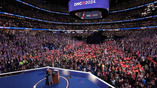 Soaking up the adoration from the crowd with his wife, Jill. Picture: Mike Segar/AFP