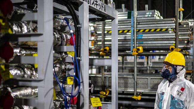 Kenichi Takahara, risk communicator of the Fukushima Daiichi decontamination and decommissioning engineering company, visits the Fukushima Daiichi nuclear power plant. Picture: Philip Fong/AFP