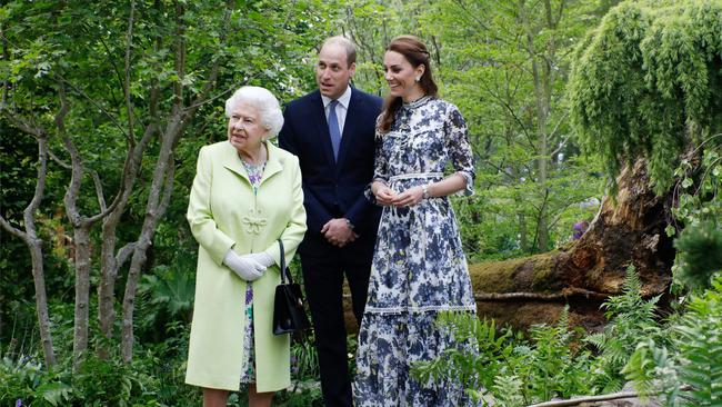 Queen Elizabeth with the roayl couple. Photography: Luke MacGregor