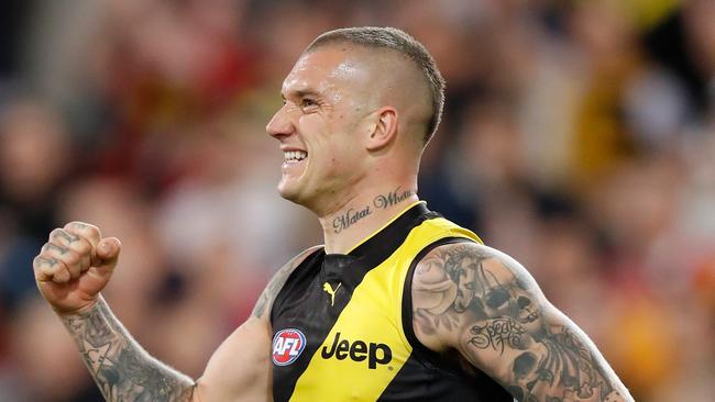 Dustin Martin celebrates one of his six goals against Brisbane Lions.